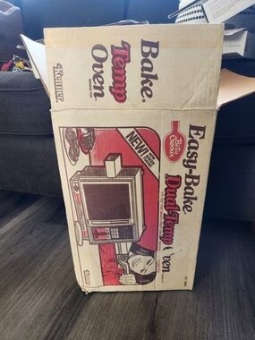 vintage 1983 Kenner Easy-Bake Dual-Temp Oven in its original box.